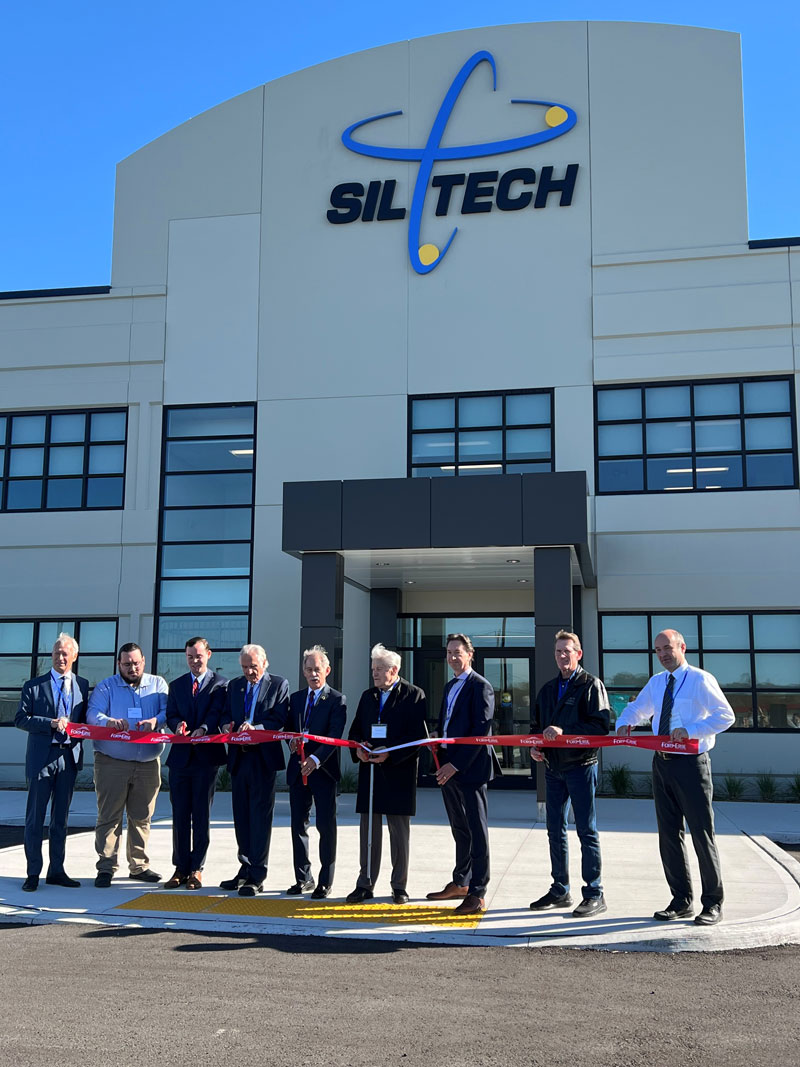 Siltech President Dag Enhorning and Fort Erie Mayor Wayne Redekop join Siltech and local representatives to cut the ribbon at Siltech's new manufacturing facility.